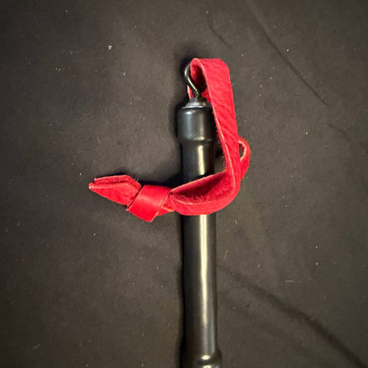 Red rubber handled dragon tail - 16 inch falls 7 inch handle