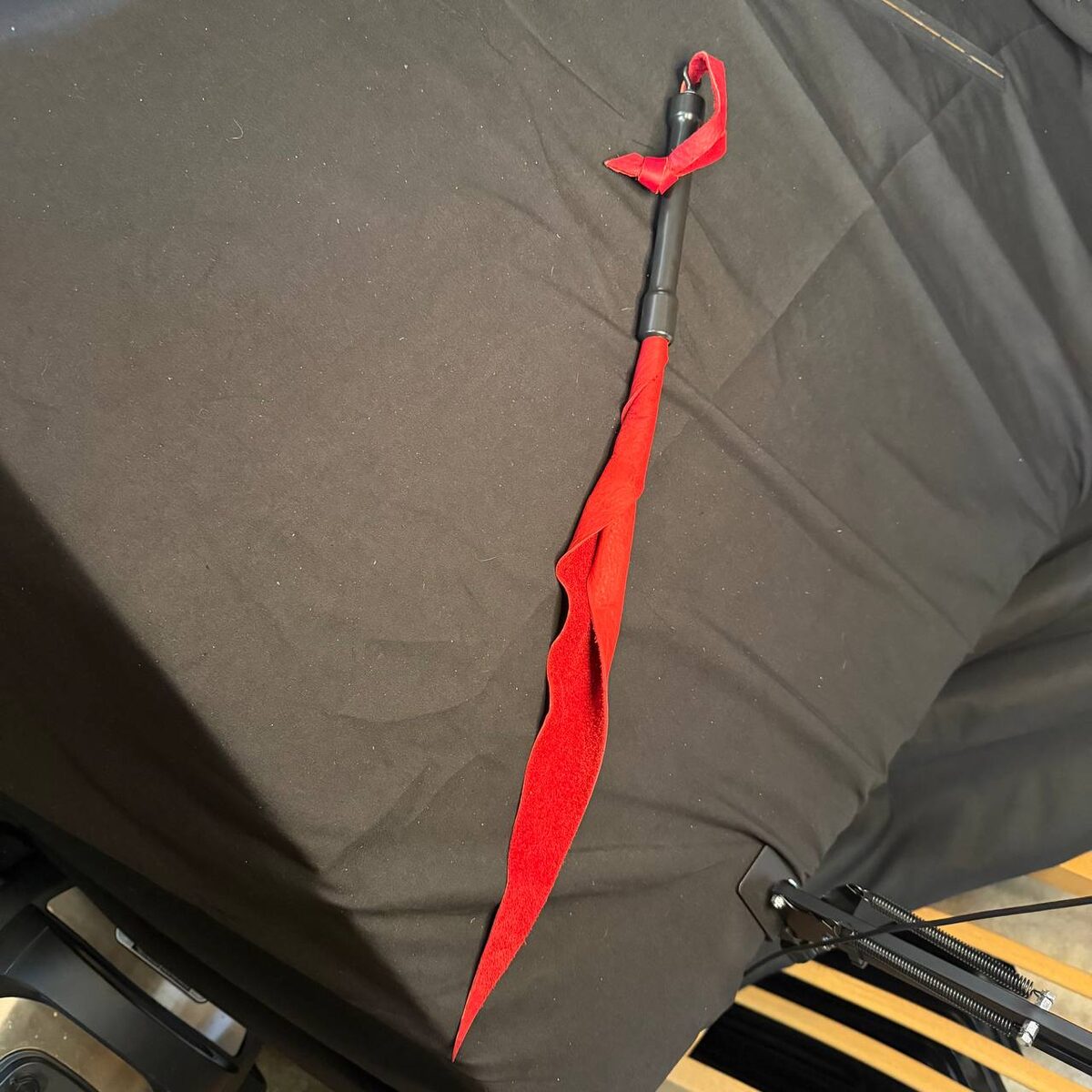 Red rubber handled dragon tail - 16 inch falls 7 inch handle