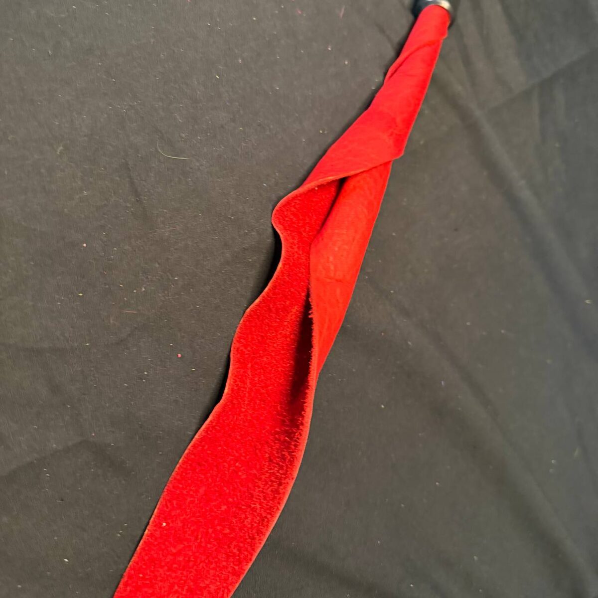 Red rubber handled dragon tail - 16 inch falls 7 inch handle