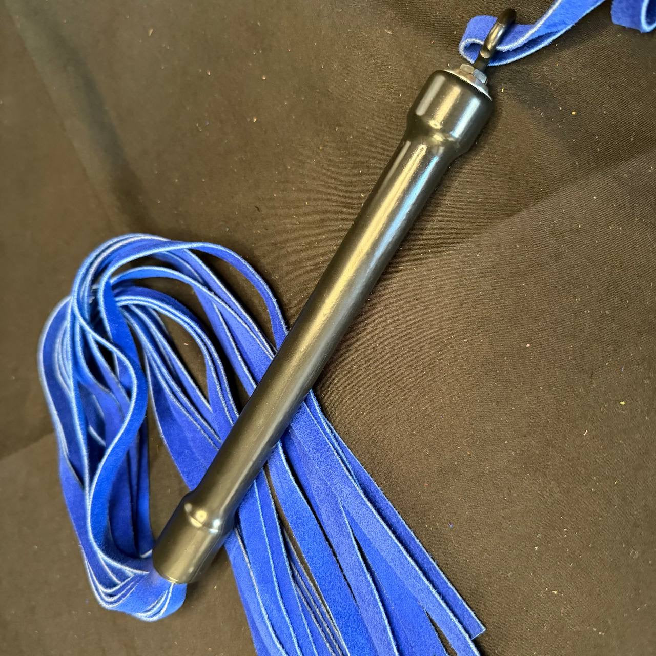Royal blue suede rubber handled flogger