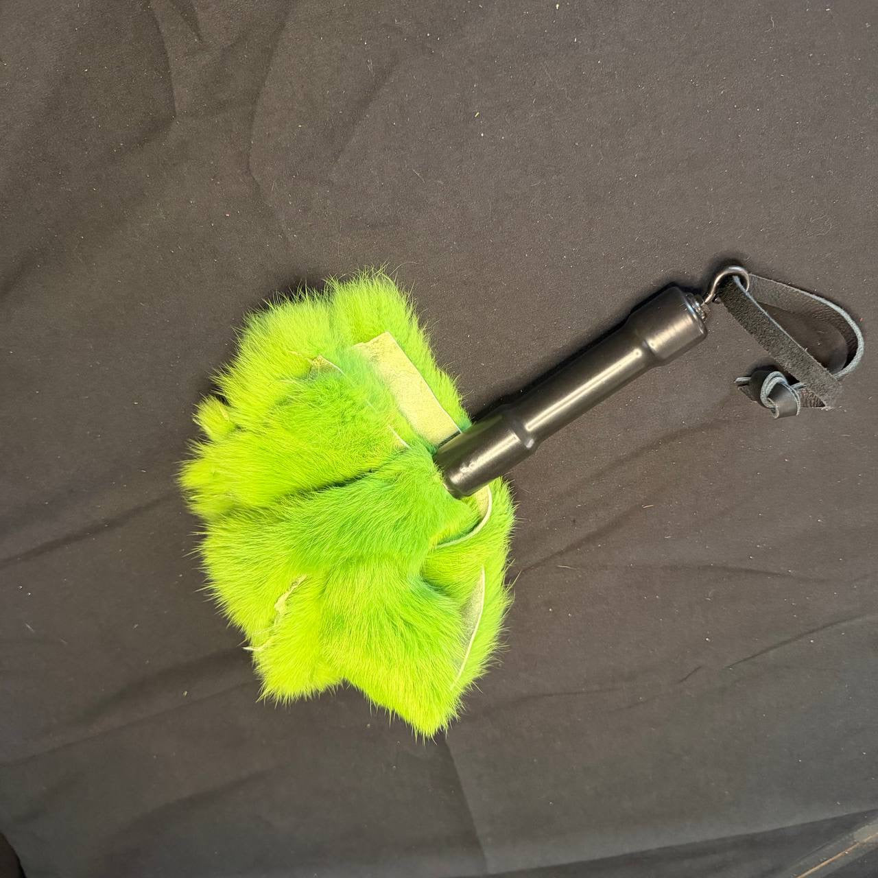 Green rubber handled bunny flogger